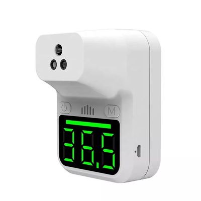 Non contatti l'istante infrarosso fissato al muro della fronte del termometro della temperatura del LED Digital che legge l'esposizione
